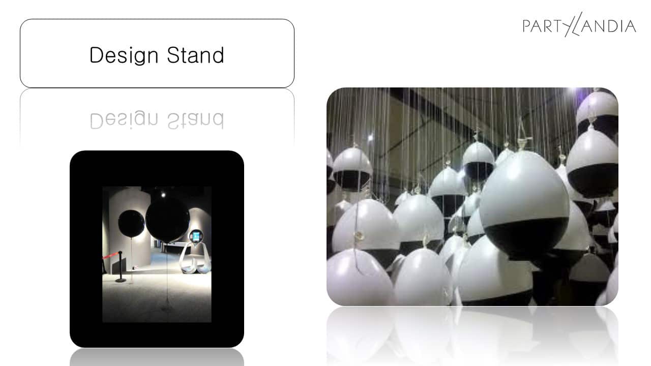 esempi di scenografie per stand fieristici moderni con palloni enormi sospesi